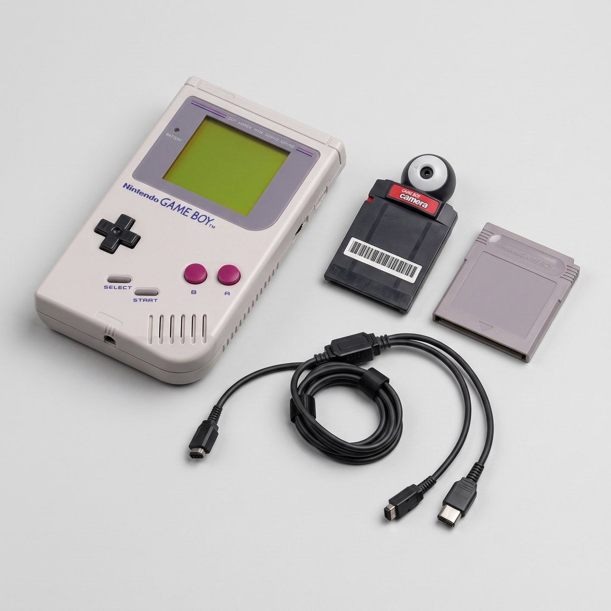 Game Boy original con Game Boy Camera, cartucho y cable Link