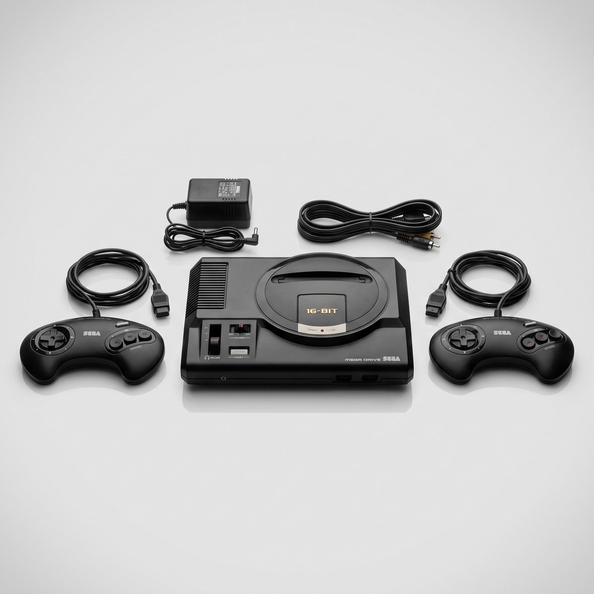 SEGA Mega Drive con dos mandos, fuente de alimentación y cables