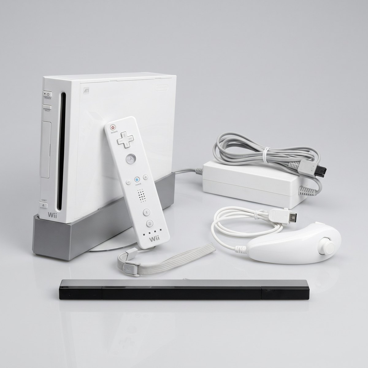 Nintendo Wii completa con Wiimote, Nunchuk, barra sensora y cables originales