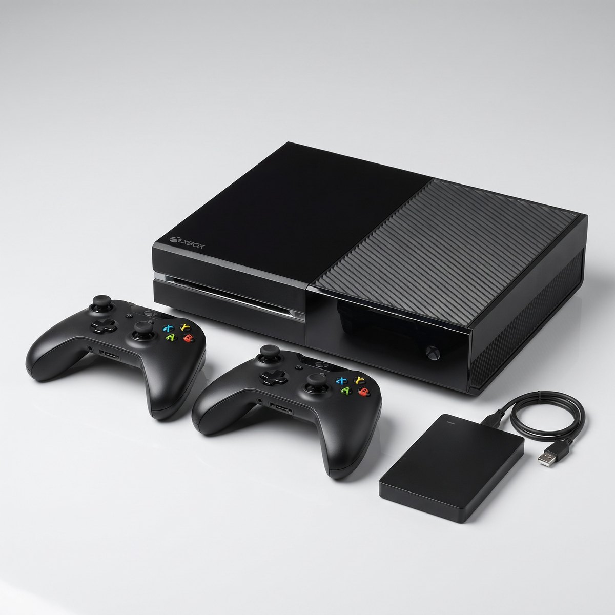 Xbox One con dos mandos y disco duro externo